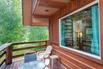 Relax and take in the woodland views from the homes wrap around deck.